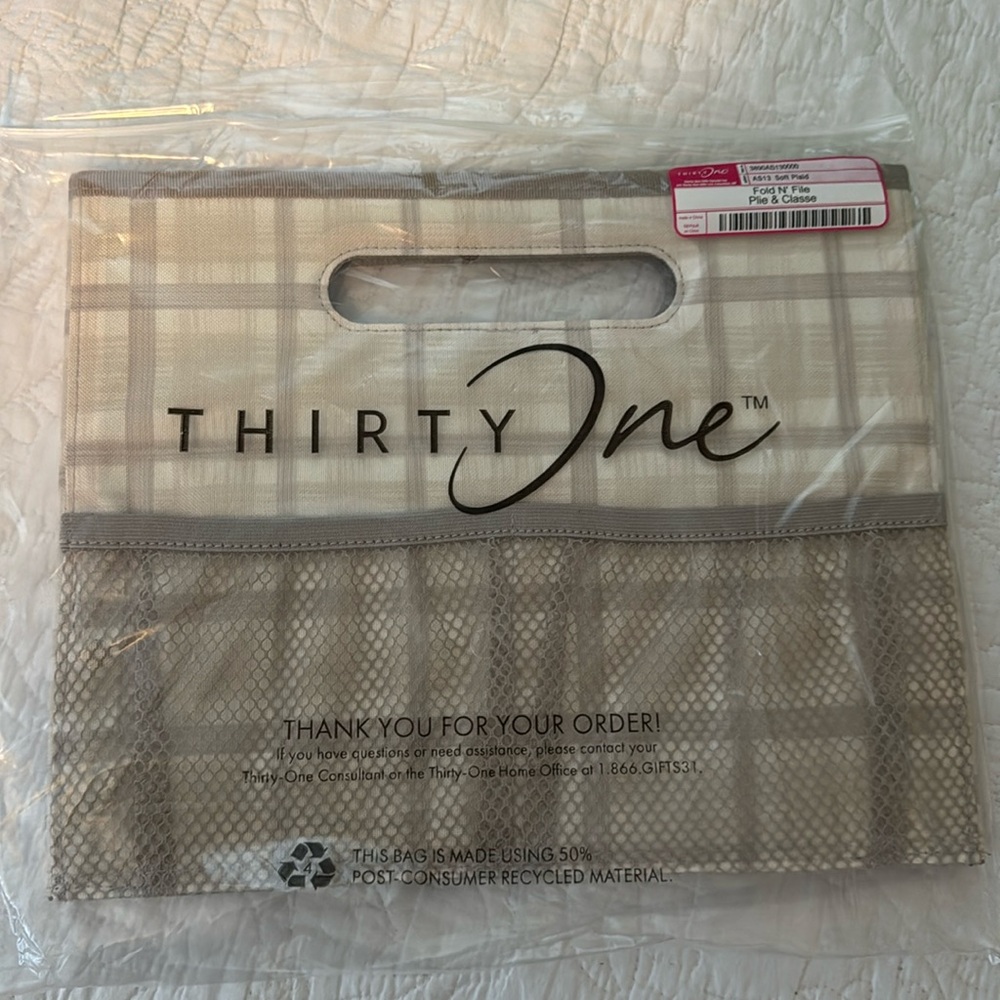 Fold N' File, new in bag. Color is called “Soft Plaid”.